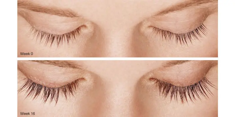 A woman with long eyelashes and no makeup.