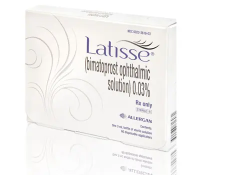 A box of latisse eye drops on top of a mirror.