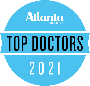 A blue circle with the words atlanta magazine top doctors 2 0 2 1