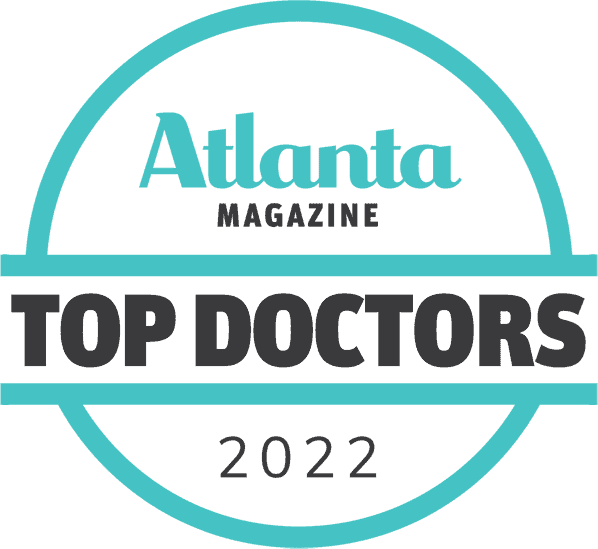 A badge that says atlanta magazine top doctors 2 0 1 9