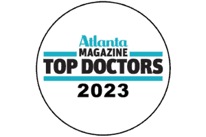 A badge that says atlanta magazine top doctors 2 0 2 3